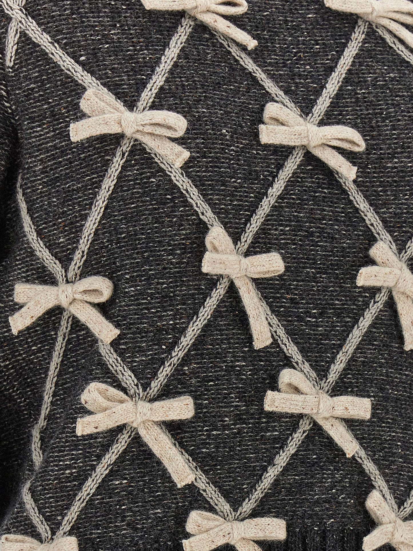 Cardigan by Moschino for women in wool & silk gray & patterned showcases a captivating silhouette, artfully detailed with a captivating and for a truly sophisticated captivating look.