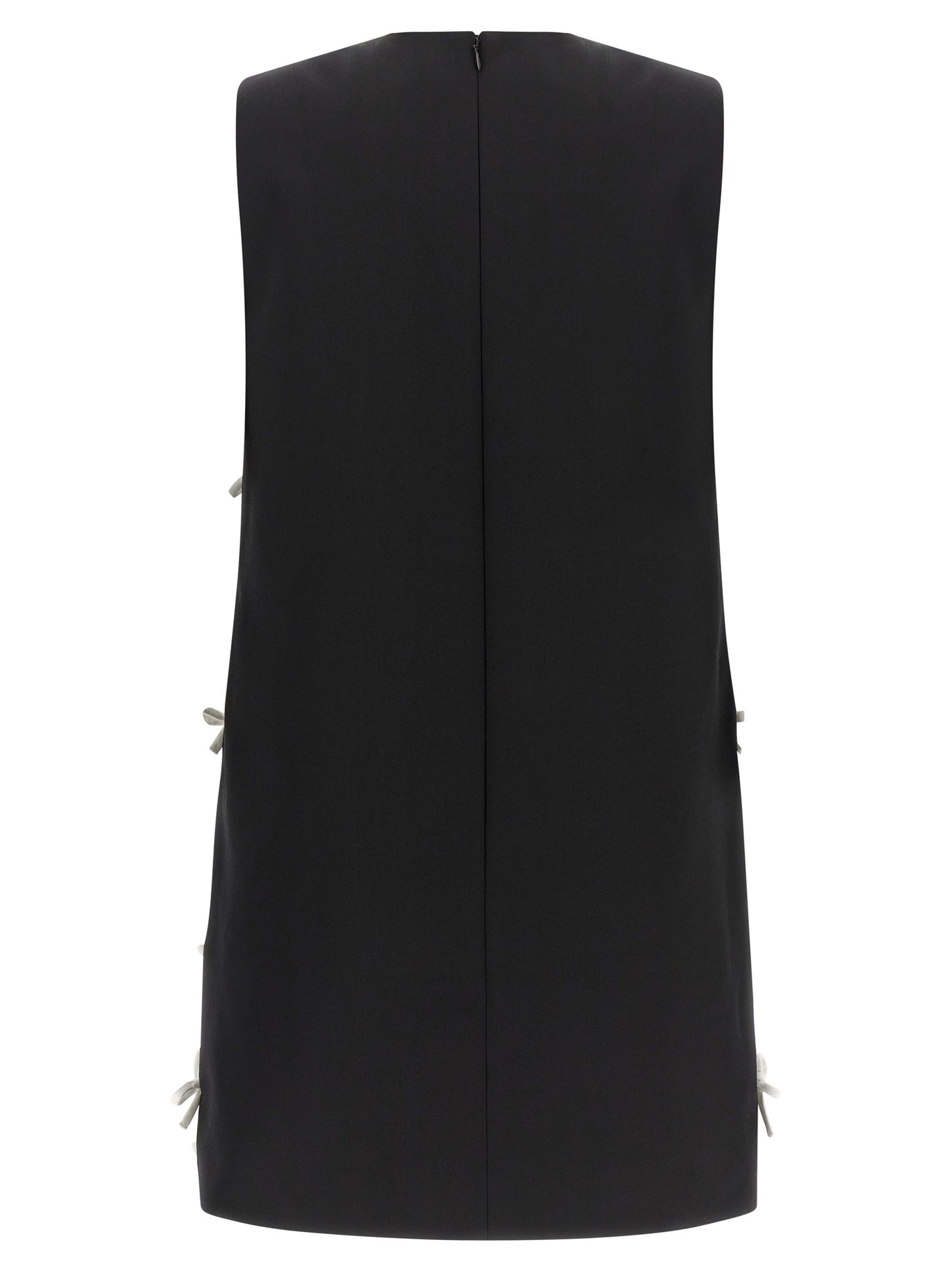 Dress by Moschino for women in virgin wool bicolour & patterned features a dramatic silhouette, showcasing an elegant round neckline and that flows into a dramatic short mini.