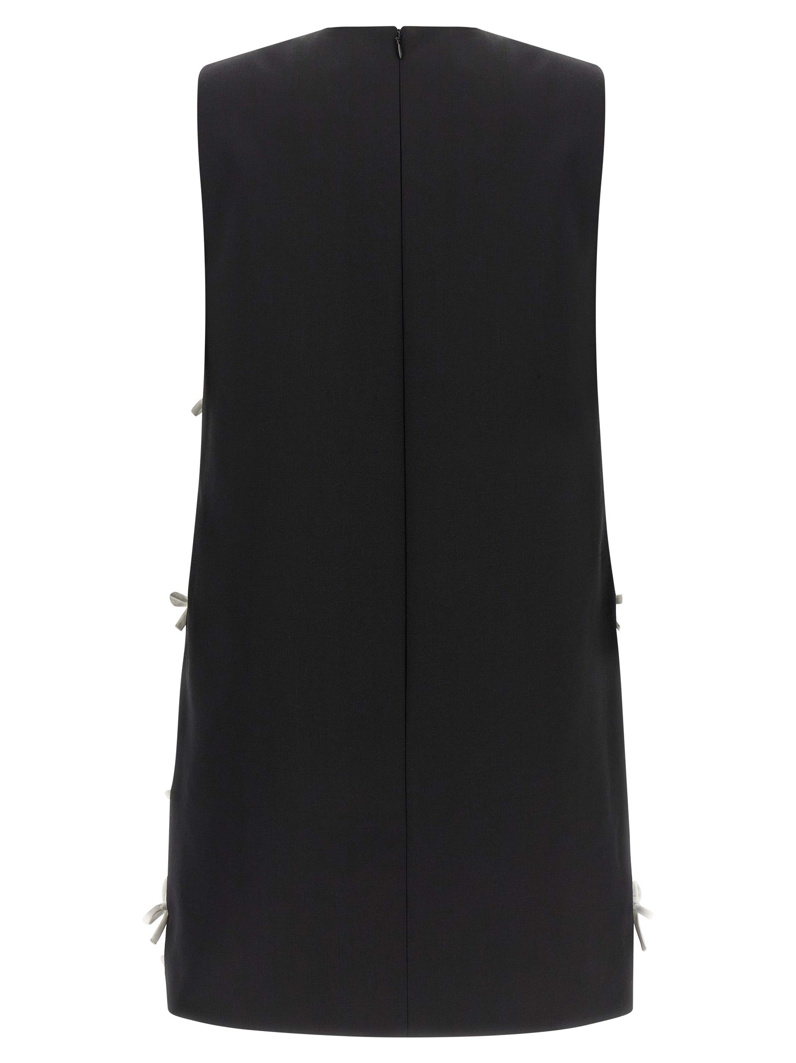 Dress by Moschino for women in virgin wool bicolour & patterned features a dramatic silhouette, showcasing an elegant round neckline and that flows into a dramatic short mini.