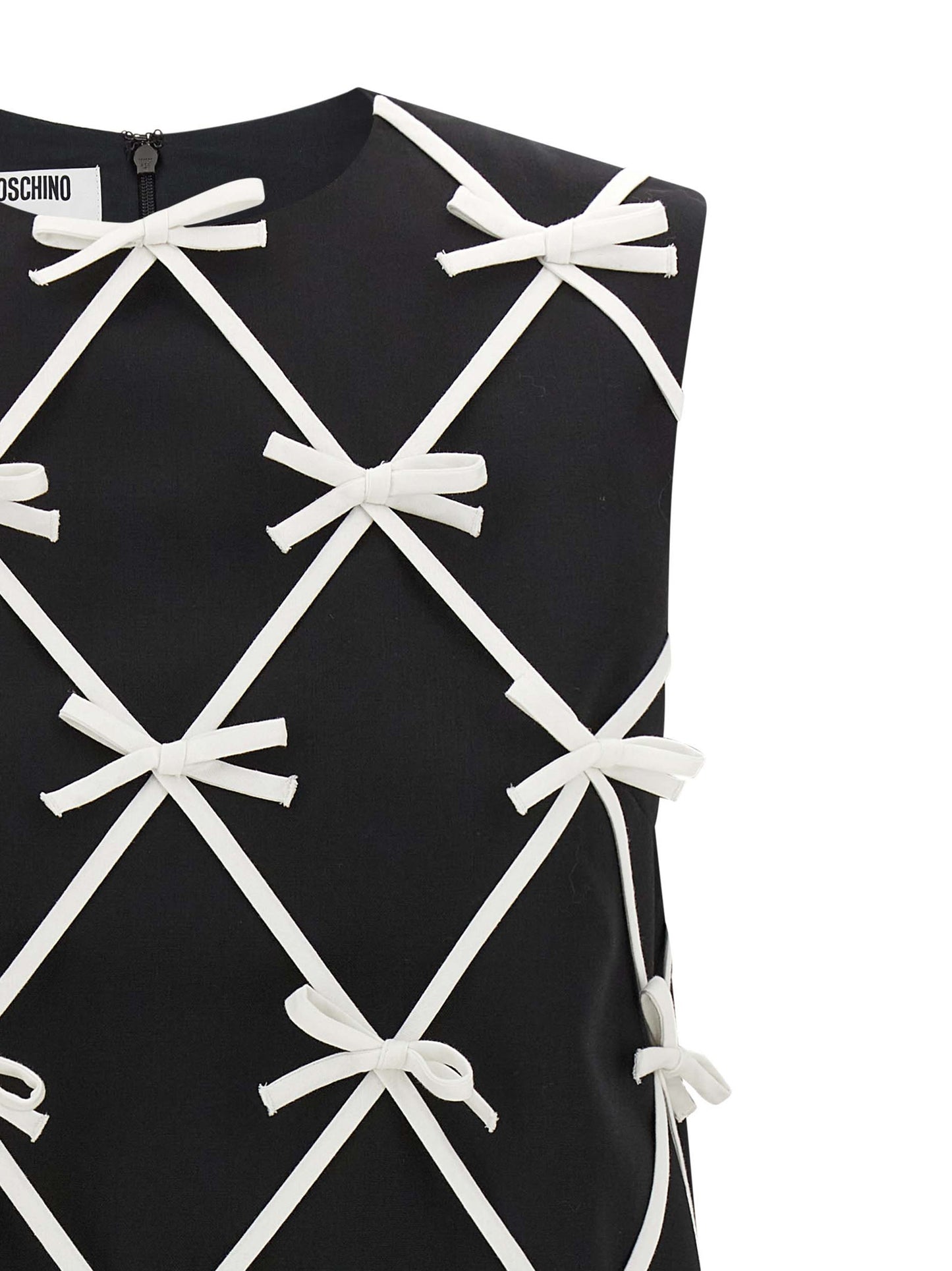 Dress by Moschino for women in virgin wool bicolour & patterned features an eye catching silhouette with a sophisticated round neckline, elegant , and a refined short mini for a eye catching aesthetic.