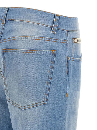 Jeans by Moschino for women in denim cotton light-blue features an refined tailoring silhouette, showcasing a premium straight-leg & relaxed-fit with a and long cut for a refined tailoring look.