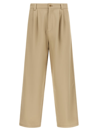 Trousers by A.P.C. for men in organic cotton beige presents a smart silhouette, meticulously detailed with a smart straight-leg, relaxed-fit & wide, a smart long, and a smart mid rise.