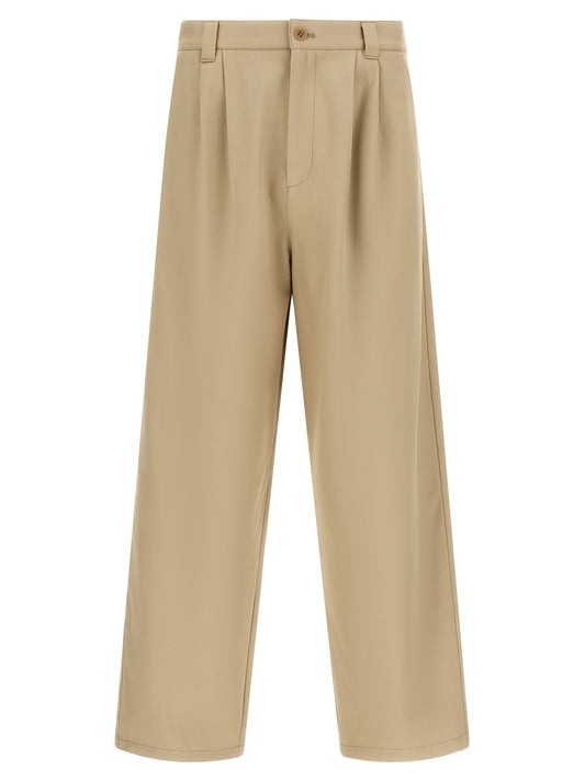 Trousers by A.P.C. for men in organic cotton beige presents a smart silhouette, meticulously detailed with a smart straight-leg, relaxed-fit & wide, a smart long, and a smart mid rise.