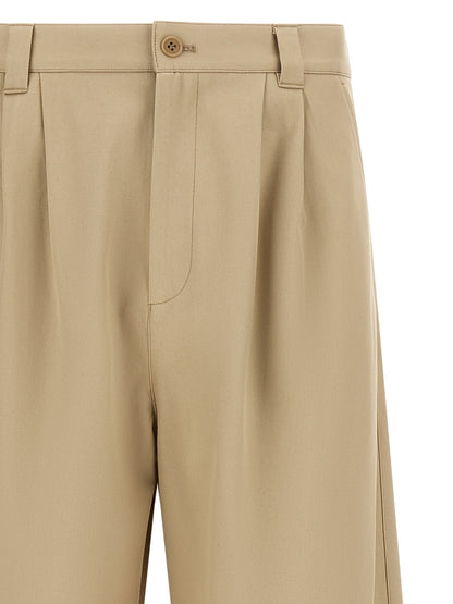 Trousers by A.P.C. for men in organic cotton beige features a artisanal silhouette, showcasing a sophisticated straight-leg, relaxed-fit & wide with a long and mid rise for a artisanal finish.