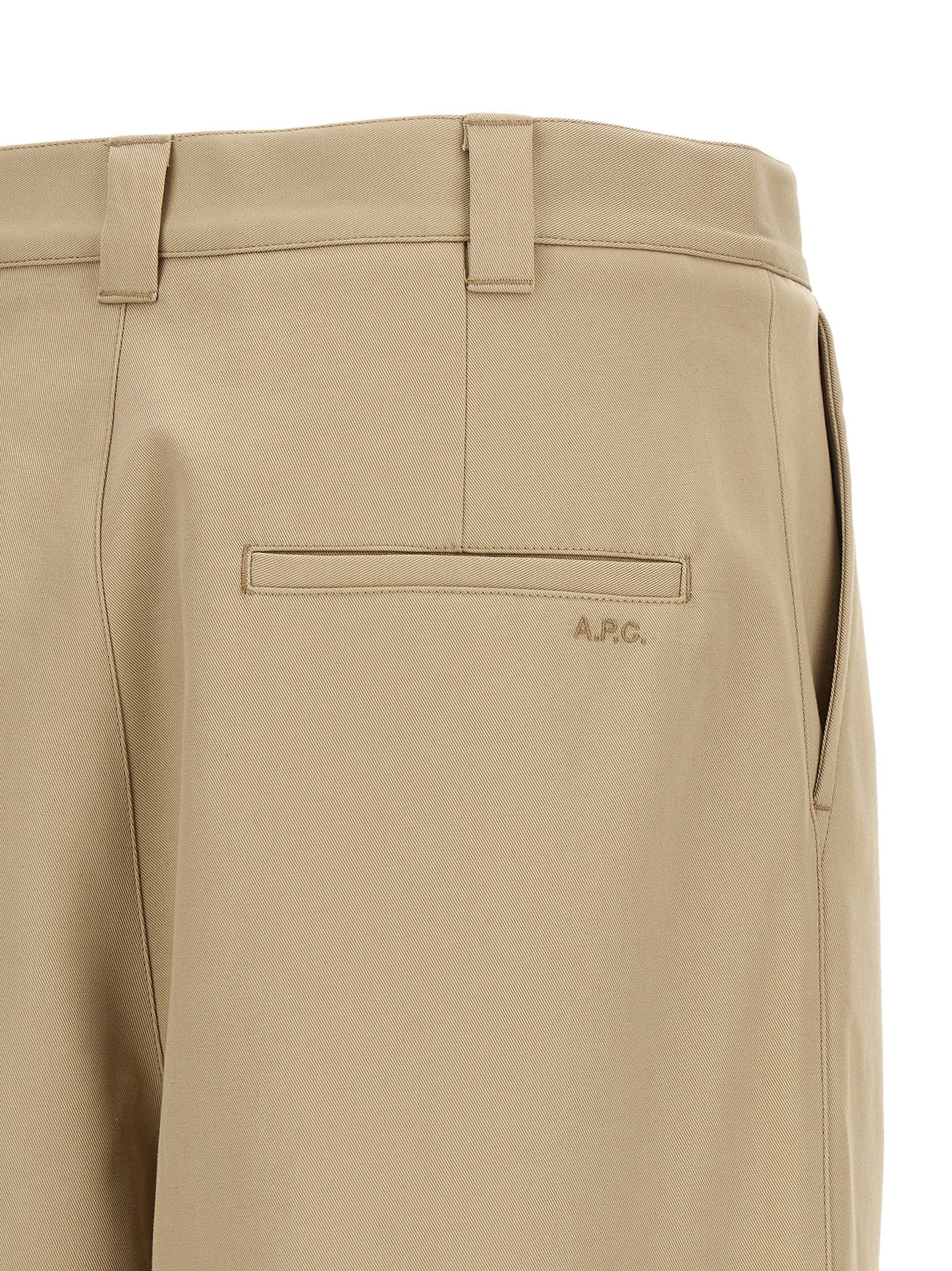 Trousers by A.P.C. for men in organic cotton beige features a tailored silhouette with a tailored straight-leg, relaxed-fit & wide, defined by its long and a sophisticated mid rise.