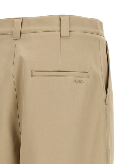 Trousers by A.P.C. for men in organic cotton beige features a tailored silhouette with a tailored straight-leg, relaxed-fit & wide, defined by its long and a sophisticated mid rise.