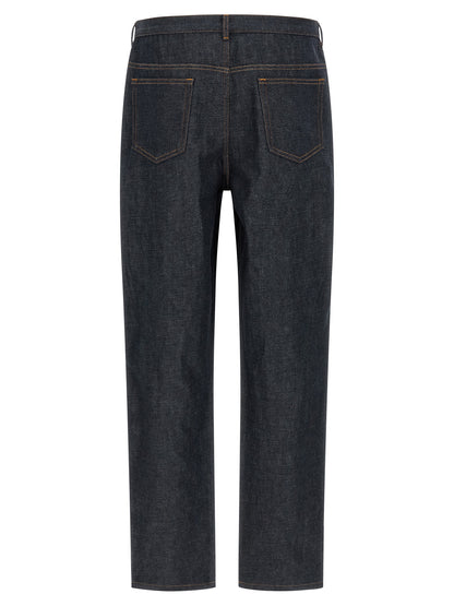 Jeans by A.P.C. for men in denim cotton blue, indigo & silver presents a tailored silhouette, showcasing a tailored straight, relaxed-fit & wide and long cut with a refined low rise for a truly tailored aesthetic.