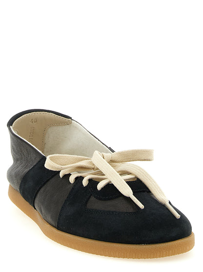 Ballet Flat Shoes by Maison Margiela for women in nappa & suede lamb leather black, natural, white & signature features an captivating silhouette, showcasing the captivating style of the Women's Nappa & Suede Lamb Leather Ballet Flat Shoes with its distinct and refined .