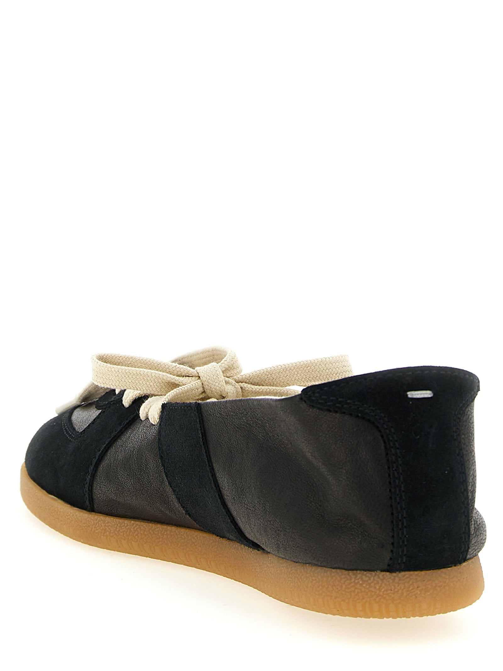 Ballet Flat Shoes by Maison Margiela for women in nappa & suede lamb leather black, natural, white & signature showcases a dynamic silhouette, artfully capturing Women's Nappa & Suede Lamb Leather Ballet Flat Shoes through its distinctive and elegant .