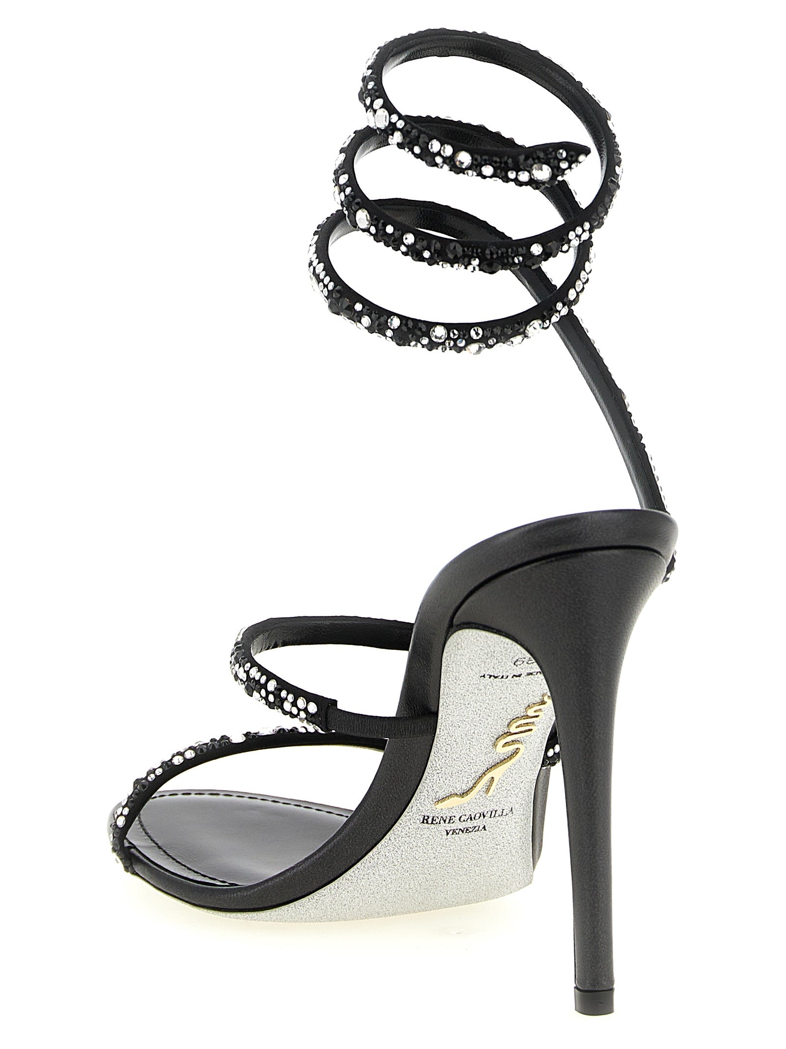 Stiletto Ankle Strap Sandals by RENE CAOVILLA for women in viscose silk leather & crystal bicolour, black, silver & signature features an exquisite silhouette, showcasing the exquisite Venezia Women's Viscose Silk Leather & Crystal Stiletto Ankle Strap Sandals with a stiletto and open toe style.