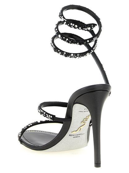 Stiletto Ankle Strap Sandals by RENE CAOVILLA for women in viscose silk leather & crystal bicolour, black, silver & signature features an exquisite silhouette, showcasing the exquisite Venezia Women's Viscose Silk Leather & Crystal Stiletto Ankle Strap Sandals with a stiletto and open toe style.