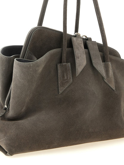 Medium Shoulder Bag by The Attico for women in suede leather dark-gray, gray & silver features a effortless chic silhouette with a secure zipper, ample , and versatile shoulder-strap & handle for a effortless chic finish.