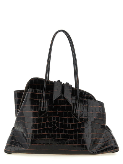 Medium Shoulder Bag by The Attico for women in exotic leather brown, silver & print presents a statuesque silhouette, showcasing a secure zipper and statuesque with versatile shoulder-strap & handle for a sophisticated look.