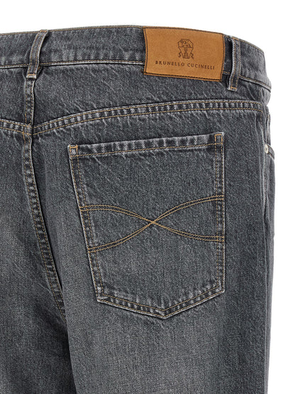 Jeans by Brunello Cucinelli for men in denim cotton gray presents a refined pantology silhouette, artfully defined by a refined pantology straight-leg, long, and a sophisticated high rise.