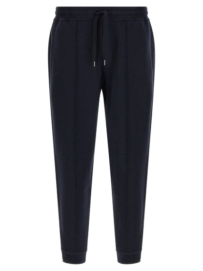 Joggers by Brunello Cucinelli for men in cashmere & silk blue presents a refined pantology silhouette, artfully defined by a refined pantology tapered-leg & regular-fit, long, and a sophisticated .