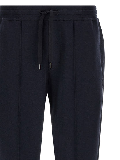 Joggers by Brunello Cucinelli for men in cashmere & silk blue features a polished silhouette with a polished tapered-leg & regular-fit, reaching a polished long and finished with a polished .