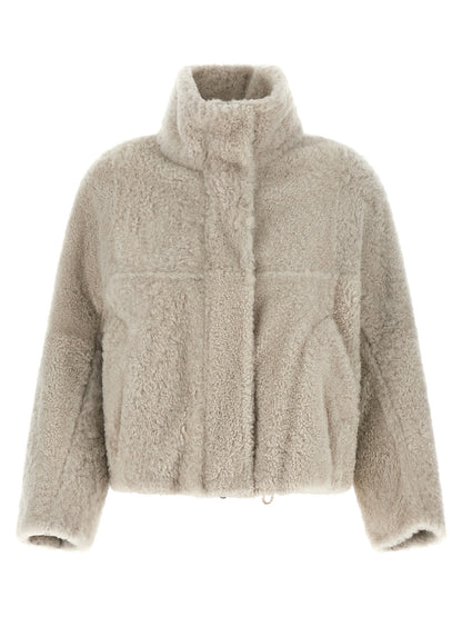 Overcoat by Brunello Cucinelli for women in lamb leather beige & natural presents a luxurious silhouette, showcasing a luxurious high-neck neckline and sophisticated pockets for a premium, luxurious look.