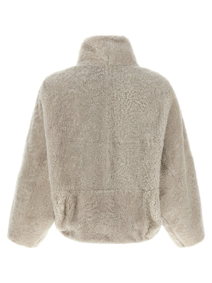 Overcoat by Brunello Cucinelli for women in lamb leather beige & natural presents a luxurious silhouette, showcasing a luxurious high-neck neckline and sophisticated pockets for a premium, luxurious look.