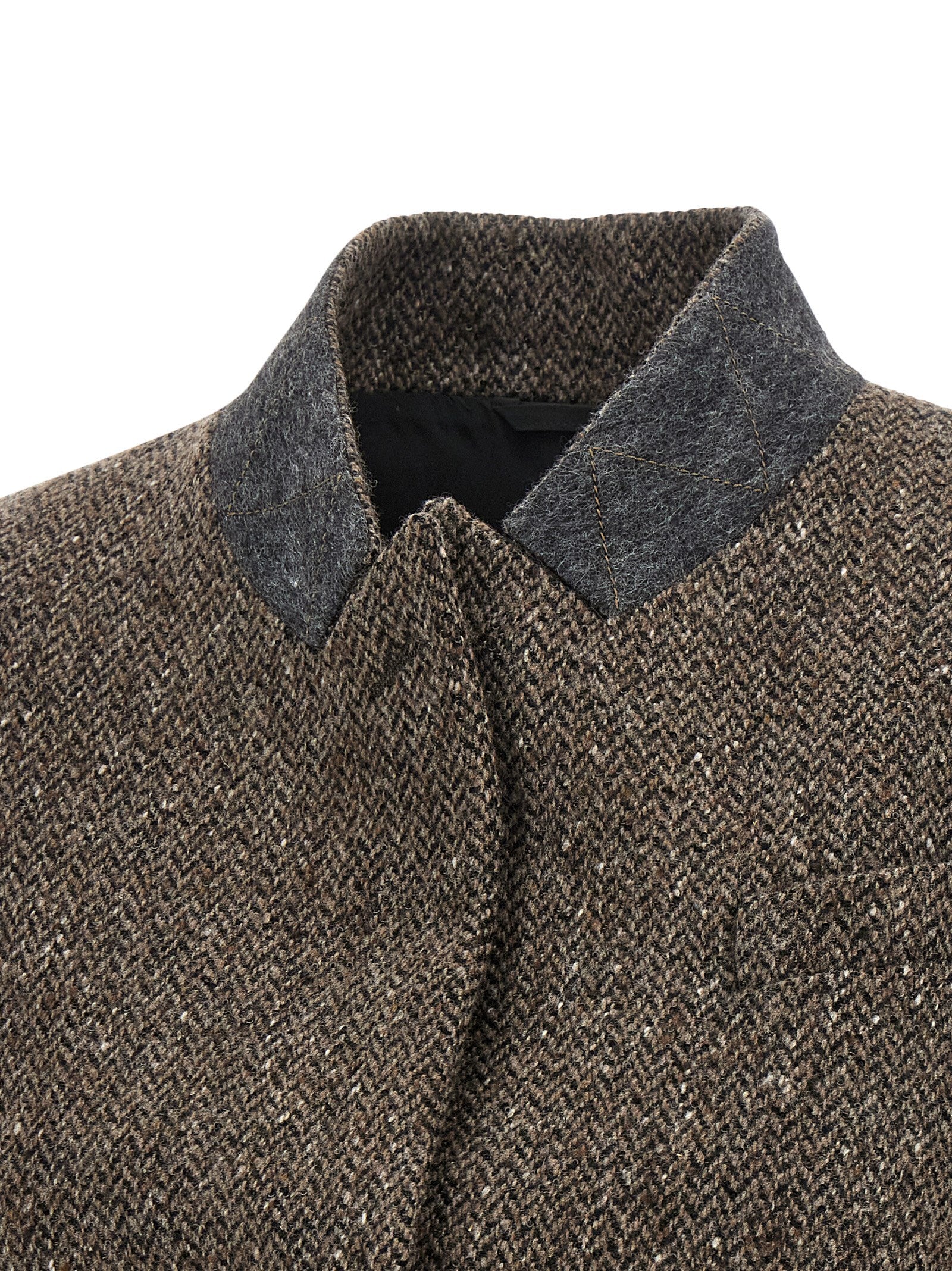 Vest by Brunello Cucinelli for women in virgin wool brown, patterned & herringbone showcases a dynamic silhouette, perfectly balancing pockets with a dynamic for a sophisticated, high-fashion look.