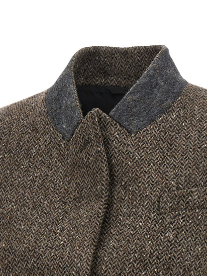 Vest by Brunello Cucinelli for women in virgin wool brown, patterned & herringbone showcases a dynamic silhouette, perfectly balancing pockets with a dynamic for a sophisticated, high-fashion look.