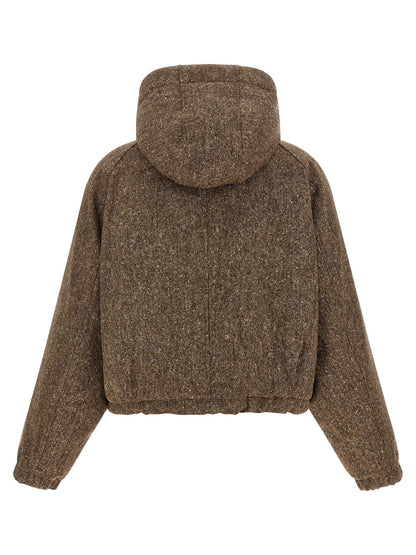 This Hooded Puffer Jacket by Brunello Cucinelli for women in nylon virgin wool tweed & goose down brown exhibits a edgy silhouette, meticulously detailed with functional pockets, hooded & insulated and a edgy hooded neckline for a edgy finish.