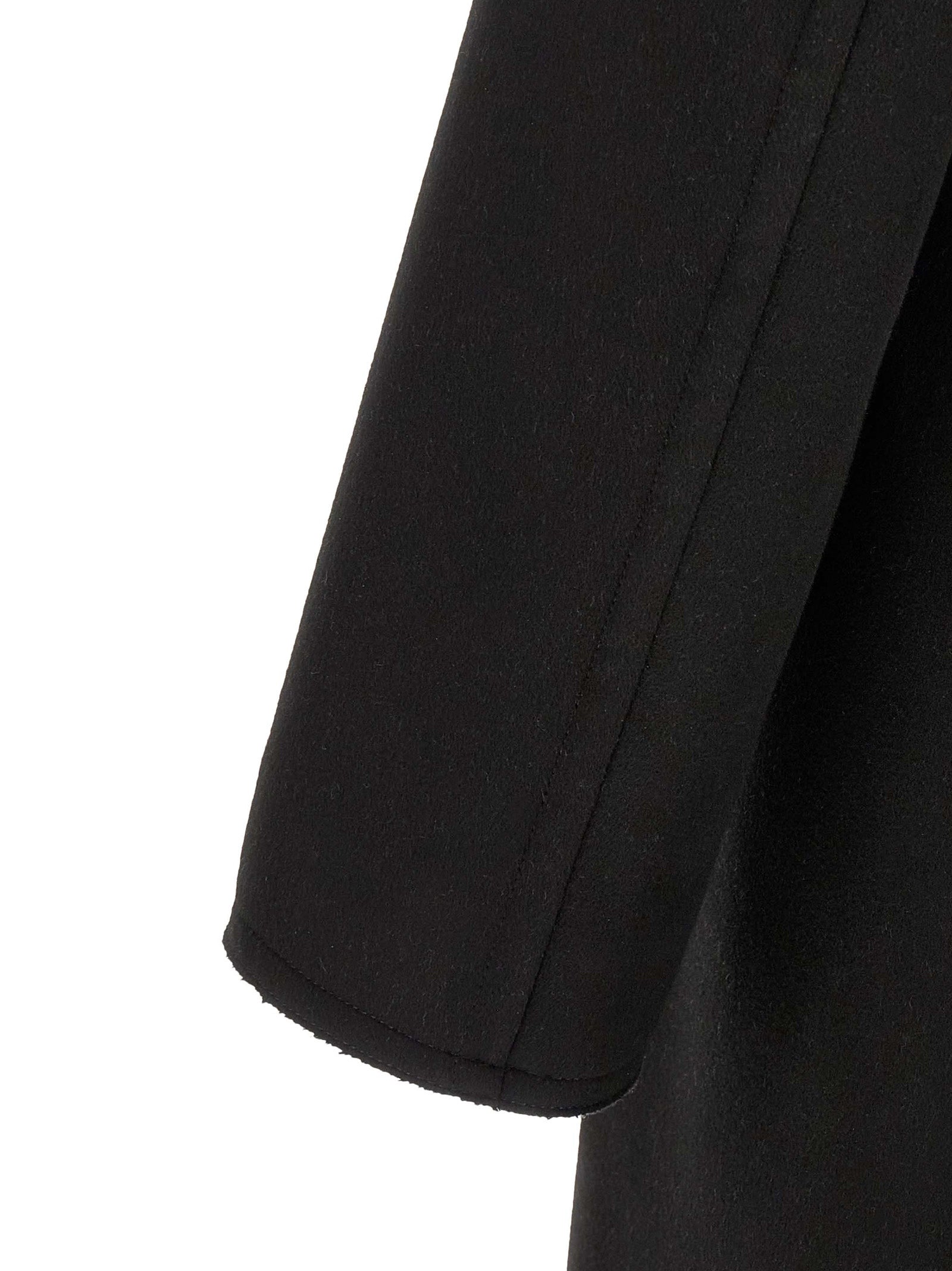 Overcoat by Tom Ford for men in cashmere virgin wool black showcases a enveloping silhouette, detailed with distinctive pockets and a enveloping .