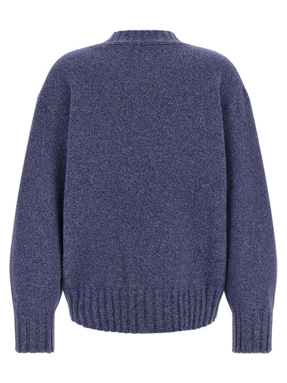Cardigan by The Attico for women in cashmere virgin wool blue & indigo showcases a captivating silhouette, artfully detailed with a captivating and crew neckline for a truly sophisticated captivating look.