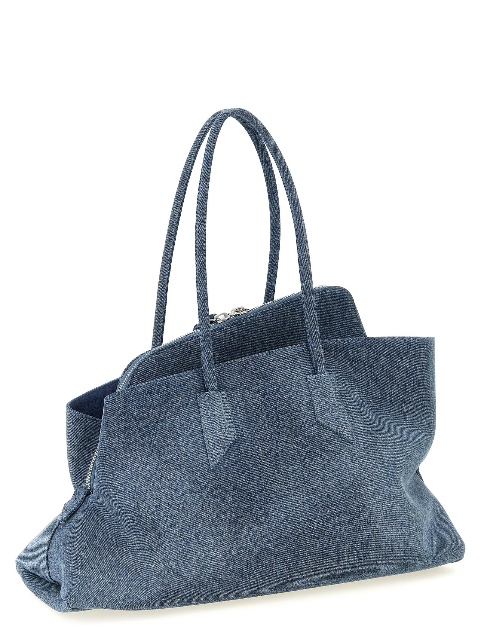 Medium Shoulder Bag by The Attico for women in stretch denim cotton & faux leather blue, silver & print features a stately silhouette, showcasing a secure zipper, ample , and stately shoulder-strap & handle for a stately finish.