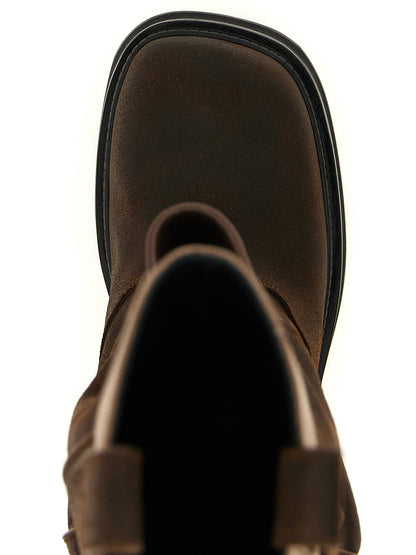 Ankle Combat Over-The-Knee Work Boots by The Attico for women in cotton canvas & bos taurus suede calf leather beige, black & brown features an enchanting design from the Women's Cotton Canvas & Bos Taurus Suede Calf Leather Ankle Combat Over-The-Knee Work Boots collection, highlighting a enchanting and square toe style for a refined look.