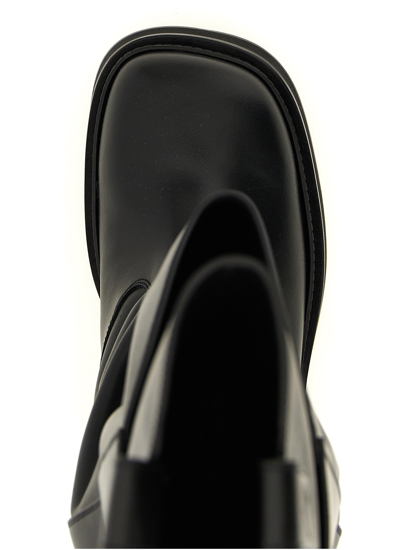 Over-The-Knee Boots by The Attico for women in calfskin leather black features an avant-garde Women's Calfskin Leather Over-The-Knee Boots silhouette, defined by a sophisticated and a avant-garde square toe style.