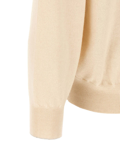 Cardigan by Brunello Cucinelli for men in cashmere white presents a textural silhouette, artfully finished with a textural turtle high-neck neckline and for a sophisticated, textural look.