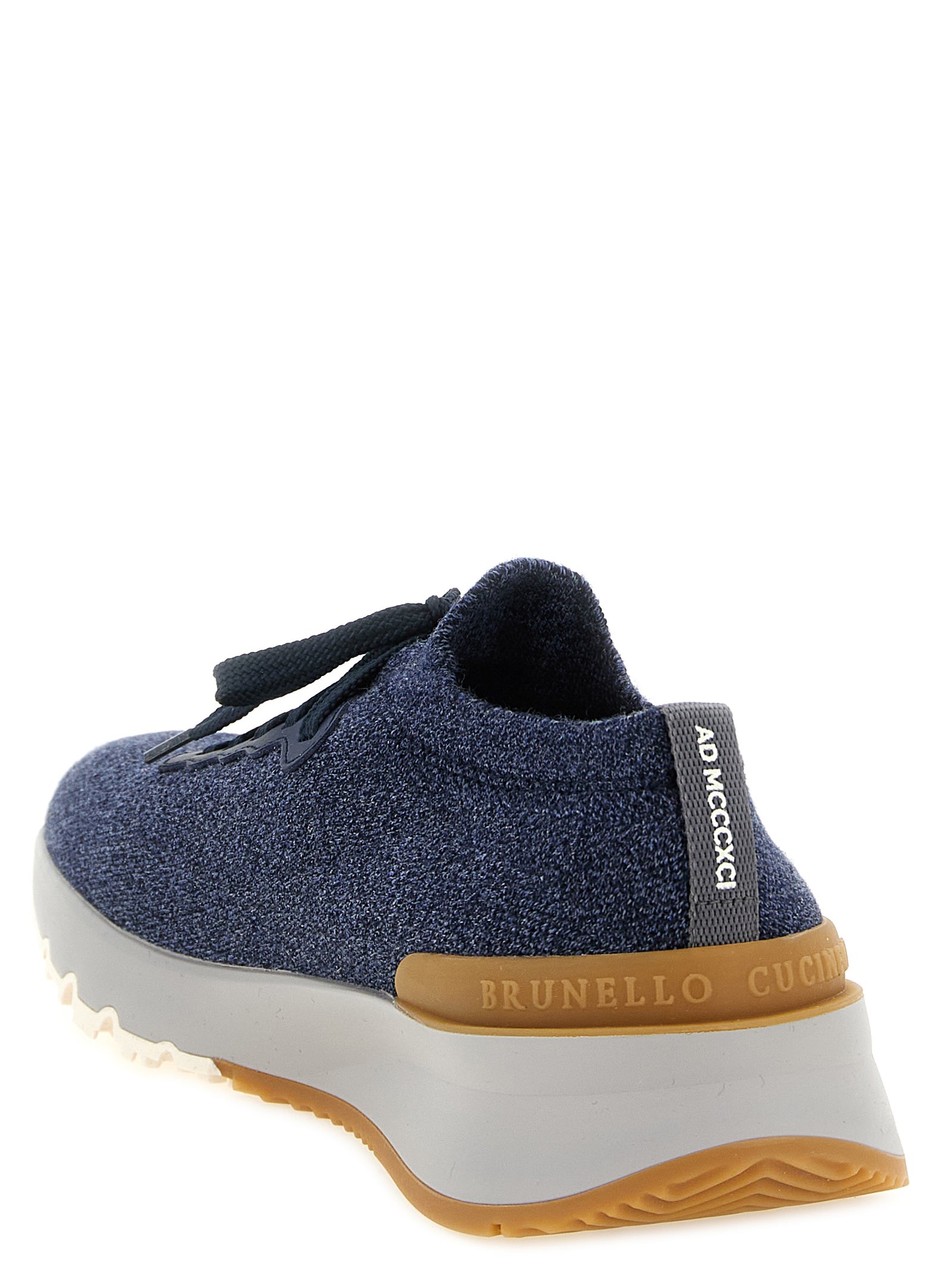 Athletic Sneakers by Brunello Cucinelli for men in wool & calfskin leather navy & jacquard features an effortless chic silhouette, showcasing the signature slip-on style of the Men's Slip On Wool & Calfskin Leather Athletic Sneakers collection with a truly effortless chic finish.