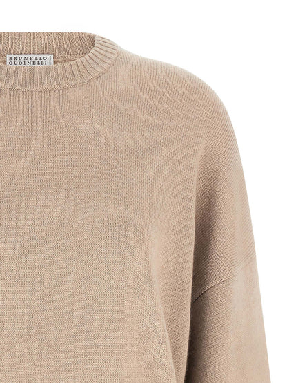 Cardigan by Brunello Cucinelli for women in cashmere & silk beige & signature features a dramatic silhouette, showcasing a sophisticated crew neckline and dramatic detail for a timeless, premium look.