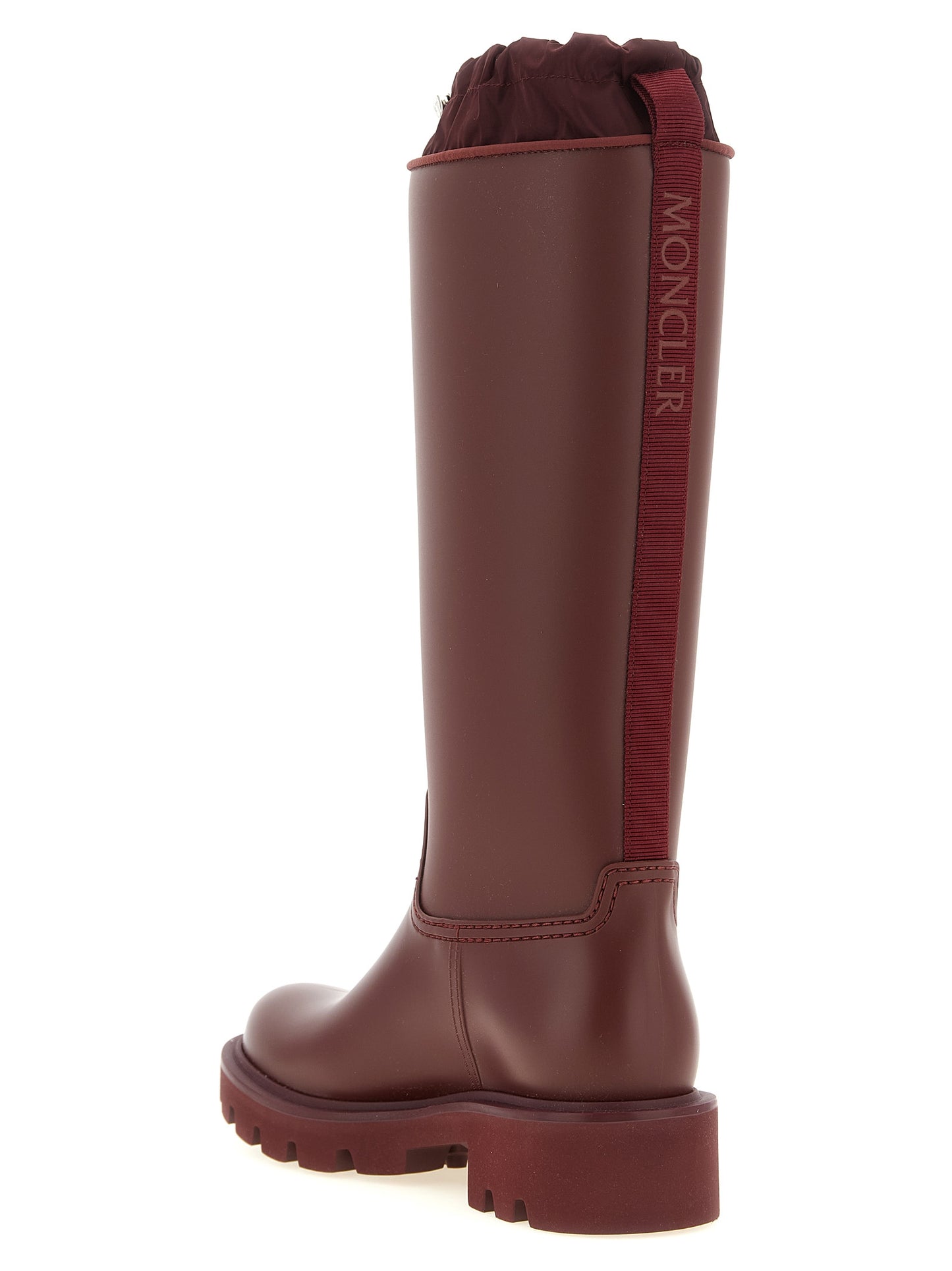 Over-The-Knee Rain Winter Boots by Moncler for women in eva pvc nylon & tu bordeaux & burgundy features an high-performance silhouette, showcasing the sophisticated design of the Ribbon Women's EVA PVC Nylon & TU Over-The-Knee Rain Winter Boots with a and a refined .