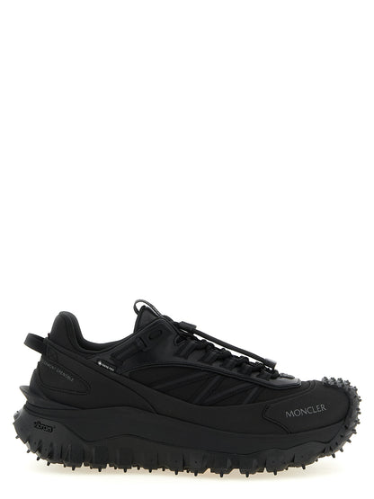 Athletic Sneakers by Moncler for men in leather black & signature showcases an impeccable silhouette, defined by an impeccable athletic style design that perfectly captures the essence of the Men's Athletic Leather Sneakers.