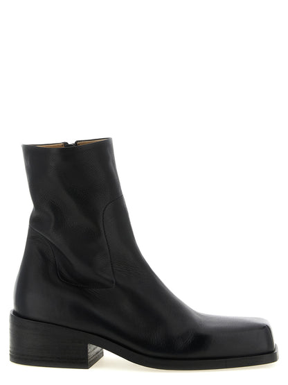 Ankle Boots by Marsell for men in calfskin leather black showcases a impeccable silhouette as Men's Calfskin Leather Ankle Boots, artfully defined by a impeccable block-heel and a impeccable square toe style.