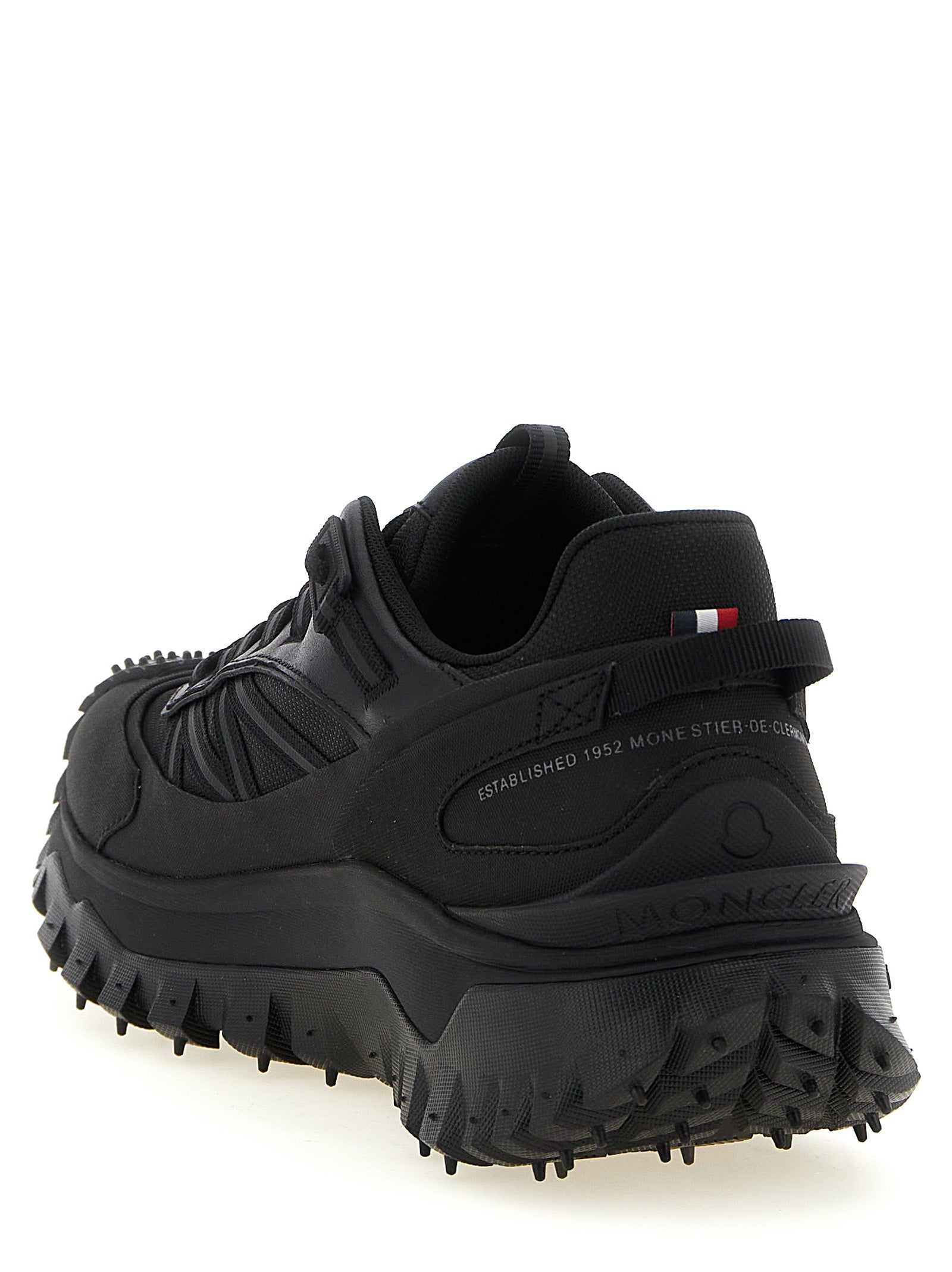 Athletic Sneakers by Moncler for men in leather black & signature showcases a architectural silhouette, artfully capturing the essence of the Men's Athletic Leather Sneakers with its signature architectural athletic style construction.