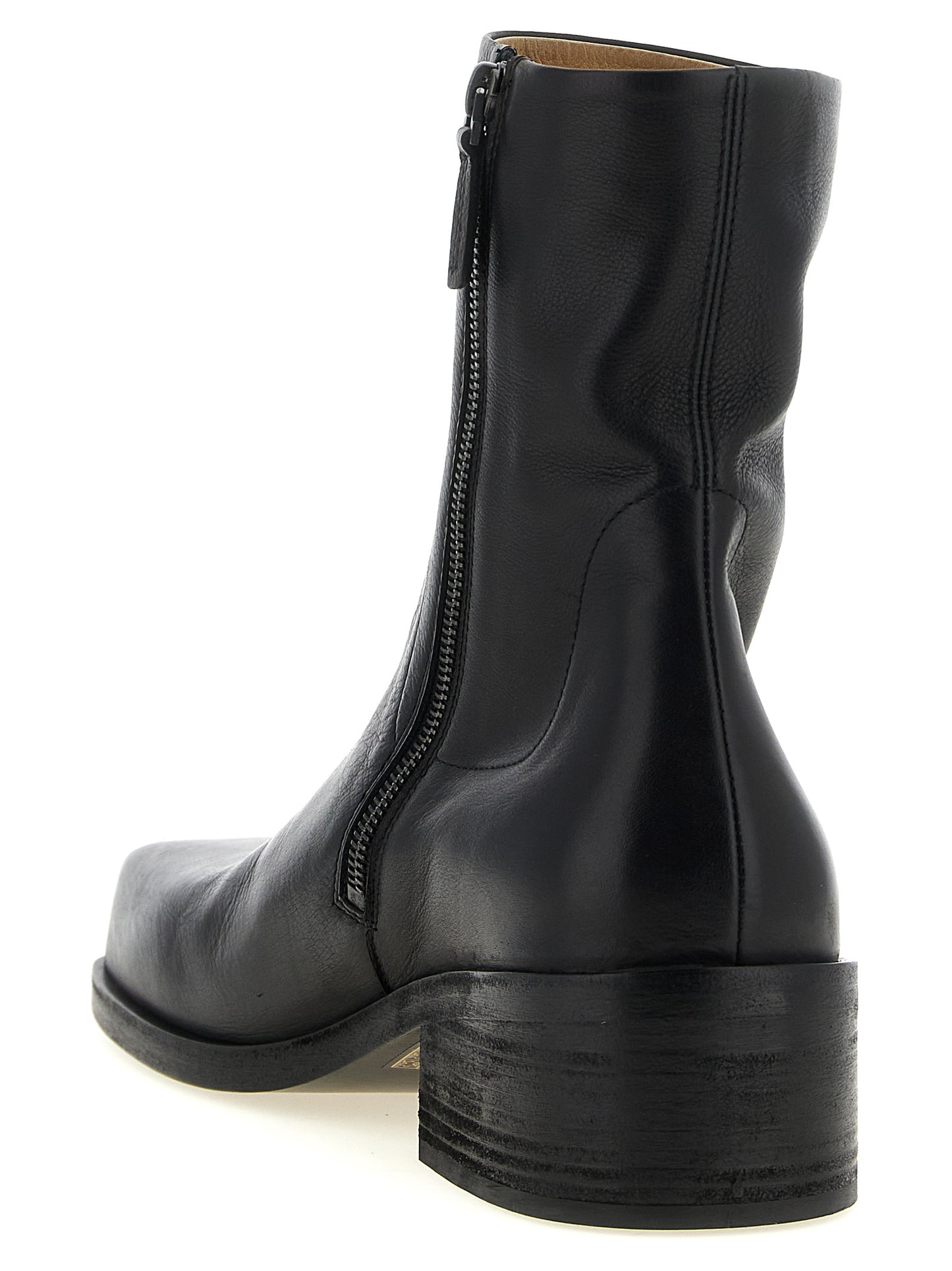 Ankle Boots by Marsell for men in calfskin leather black showcases a ergonomic silhouette from the Men's Calfskin Leather Ankle Boots collection, featuring a ergonomic block-heel and a ergonomic square toe style.