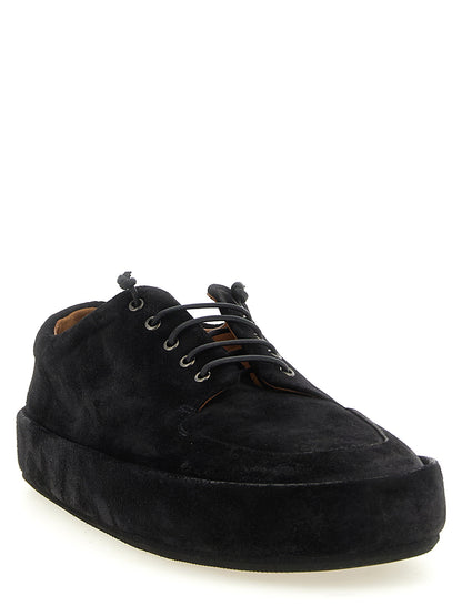 Moccasin Moccasins Lace-Up Shoes by Marsell for men in calfskin suede leather black features an effortless chic silhouette, showcasing the Men's Calfskin Suede Leather Moccasin Moccasins Lace-Up Shoes design with an effortless chic and a for a effortless chic look.