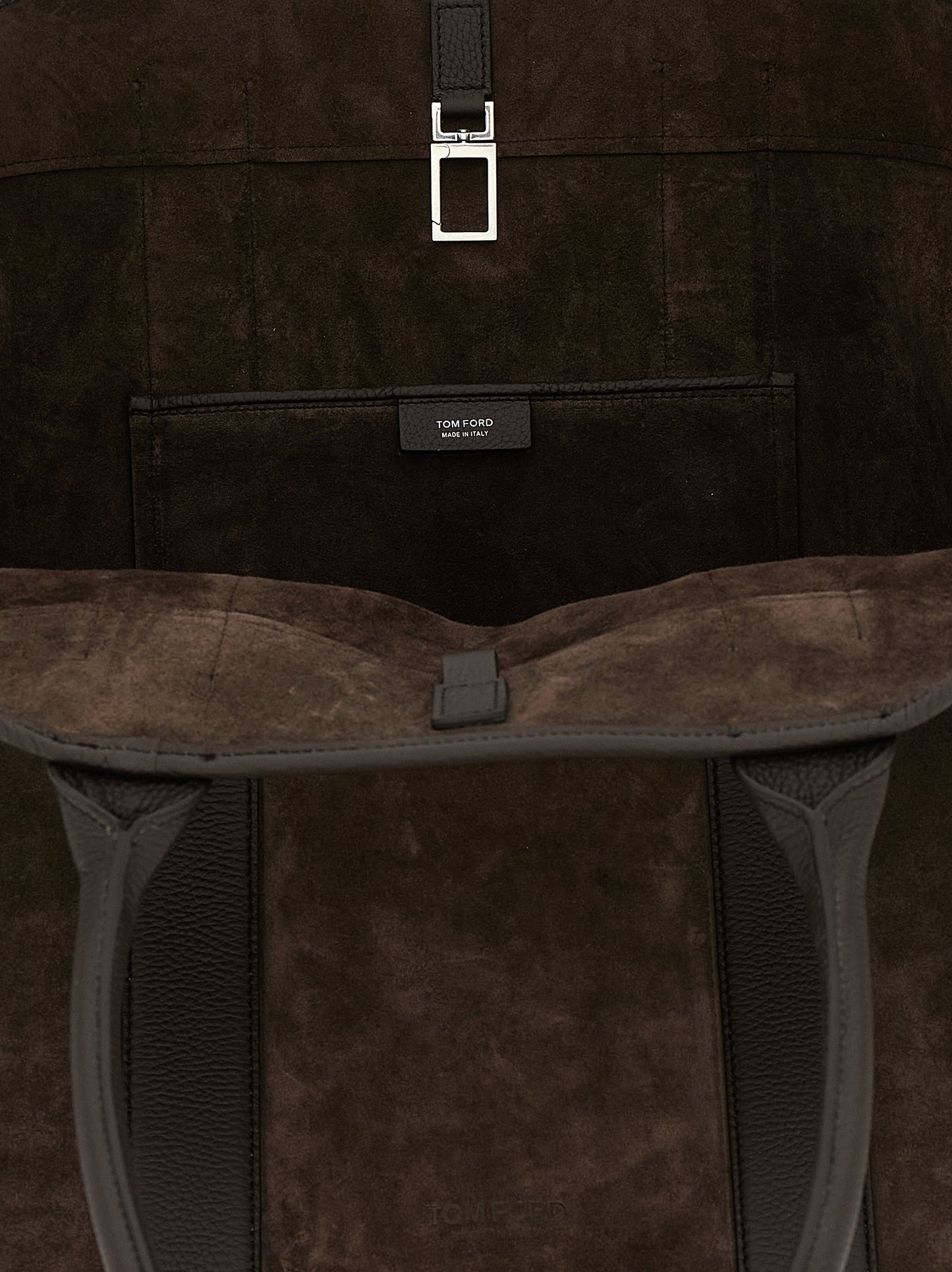 Large Pouch Tote Bag by Tom Ford for men in suede calfskin leather brown & silver features an metropolitan chic T Bar Suede Calfskin Leather Large Pouch Tote Bag design with a secure , metropolitan chic , and versatile handle for a metropolitan chic look.