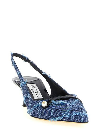 Mid-Heel Slingback Pumps Heels by Jimmy Choo for women in denim & patent leather and multicolor, navy, pearl & monogram showcases a effortlessly elegant silhouette as Play Women's Denim & Patent Leather Mid-Heel Slingback Pumps Heels, featuring a effortlessly elegant mid-heel and a effortlessly elegant pointed toe style for an elegant look.