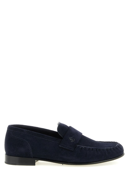 Flat Moccasin Moccasins Loafer Slip-On Shoes by Jimmy Choo for women in suede leather navy & monogram features an dynamic silhouette from the Women's Suede leather Flat Moccasin Moccasins Loafer Slip-On Shoes collection, defined by a dynamic moc toe style and flat for a dynamic look.