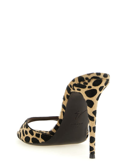 Stiletto Mules Sandals by Giuseppe Zanotti for women in calfskin wool & rhinestone animal, gold, multicolor, leopard-print & print features an statuesque Pony Women's Calfskin Wool & Rhinestone Stiletto Mules Sandals silhouette with a refined stiletto and elegant .
