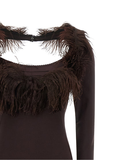 Dress by The Attico for women in viscose & ostrich leather brown features a dramatic silhouette, showcasing an elegant split wide-neck neckline and that flows into a dramatic long.
