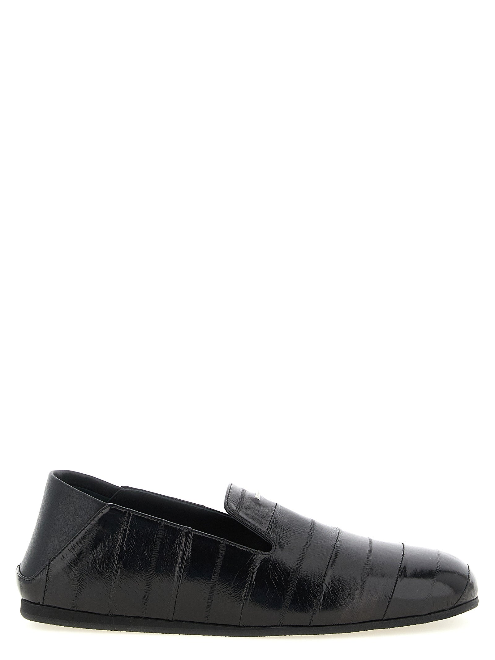 Flat Loafer Slip-On Shoes by Giuseppe Zanotti for men in eel leather black & silver showcases a impeccable silhouette as Men's Eel Leather Flat Loafer Slip-On Shoes, artfully designed with a impeccable flat and refined for a impeccable finish.