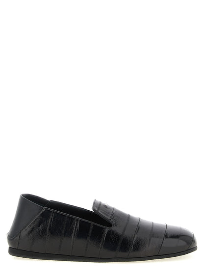 Flat Loafer Slip-On Shoes by Giuseppe Zanotti for men in eel leather black & silver showcases a impeccable silhouette as Men's Eel Leather Flat Loafer Slip-On Shoes, artfully designed with a impeccable flat and refined for a impeccable finish.