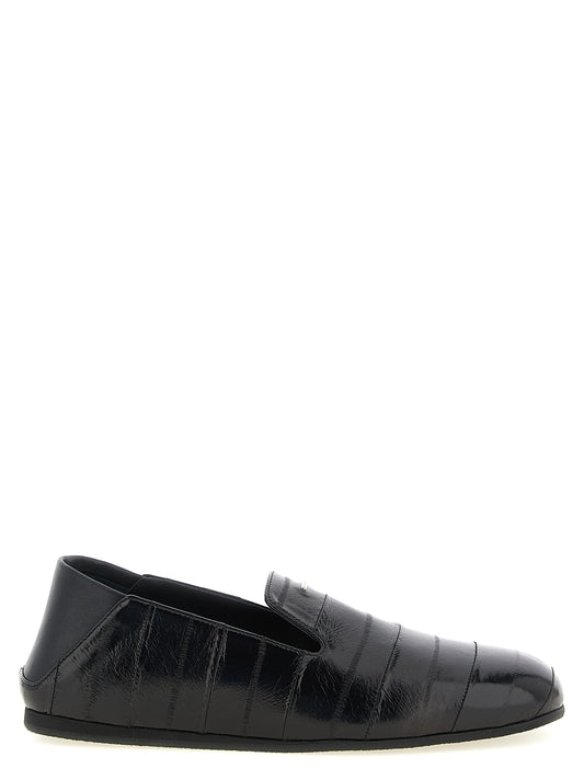 Flat Loafer Slip-On Shoes by Giuseppe Zanotti for men in eel leather black & silver showcases a impeccable silhouette as Men's Eel Leather Flat Loafer Slip-On Shoes, artfully designed with a impeccable flat and refined for a impeccable finish.