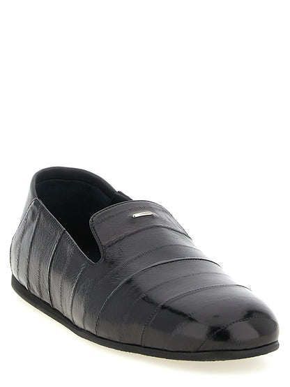Flat Loafer Slip-On Shoes by Giuseppe Zanotti for men in eel leather black & silver features an dynamic silhouette from the Men's Eel Leather Flat Loafer Slip-On Shoes collection, defined by a dynamic and flat for a dynamic look.