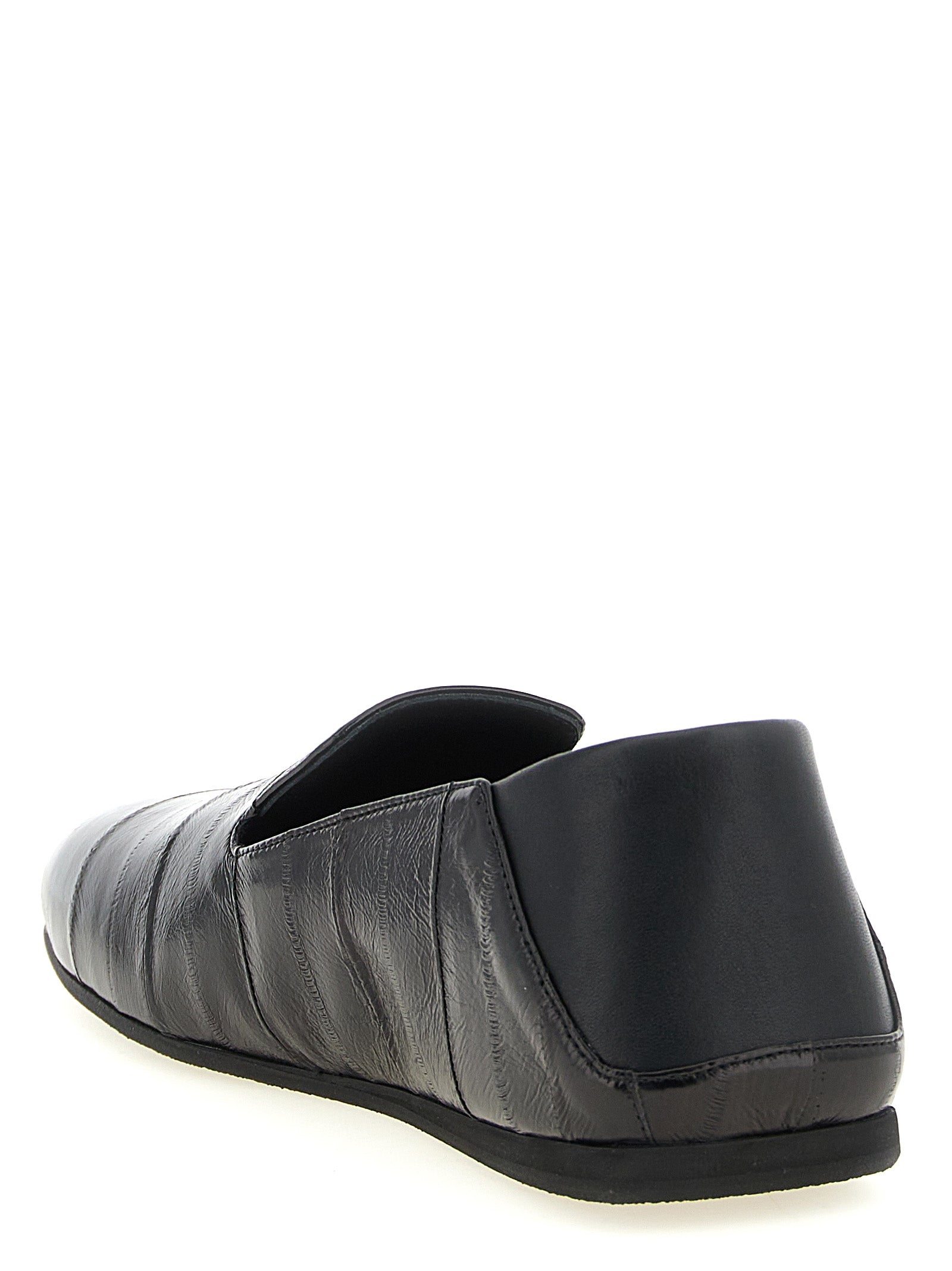 Flat Loafer Slip-On Shoes by Giuseppe Zanotti for men in eel leather black & silver features an ergonomic silhouette, perfectly showcasing Men's Eel Leather Flat Loafer Slip-On Shoes with its distinct flat and elegant .