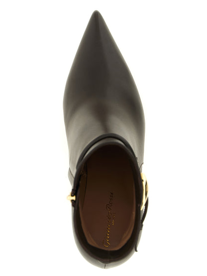 Stiletto Ankle Strap Boots by Gianvito Rossi for women in lambskin leather brown & gold features an enchanting design from the Women's Lambskin Leather Stiletto Ankle Strap Boots collection, highlighting a enchanting stiletto and for a refined look.